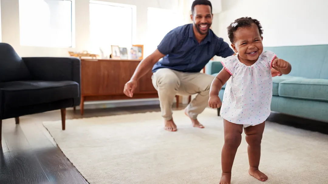 father and daughter in living room