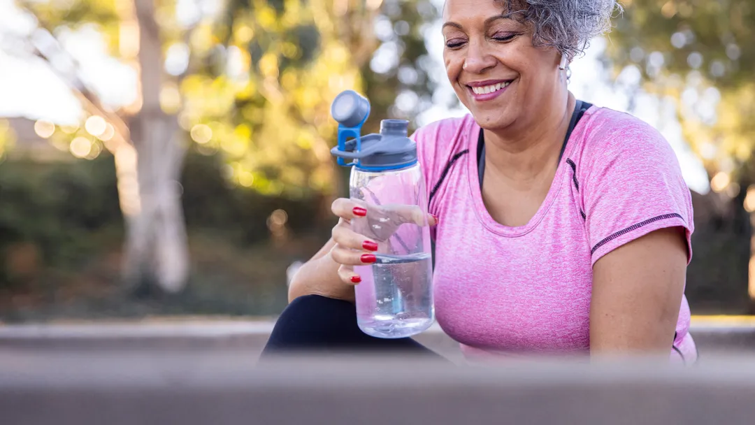 LP-Hero-Desktop-Bariatrics-MULTI-CentraTX-Woman-drinking-water-post-workout