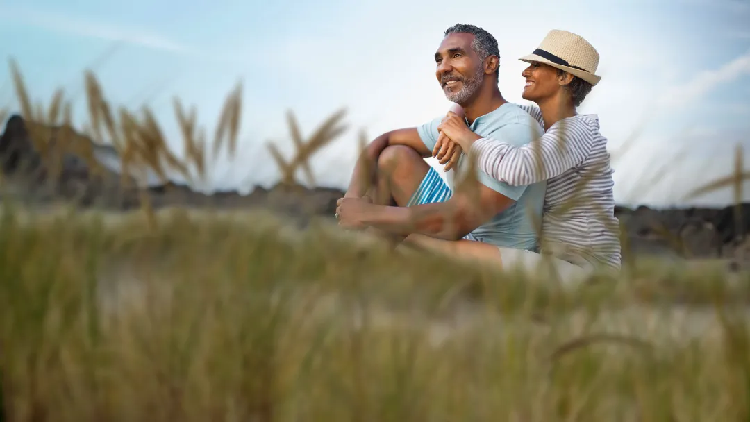 couple smiling on the beach