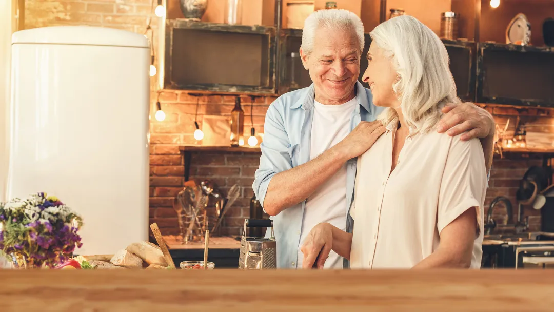 older couple cooking