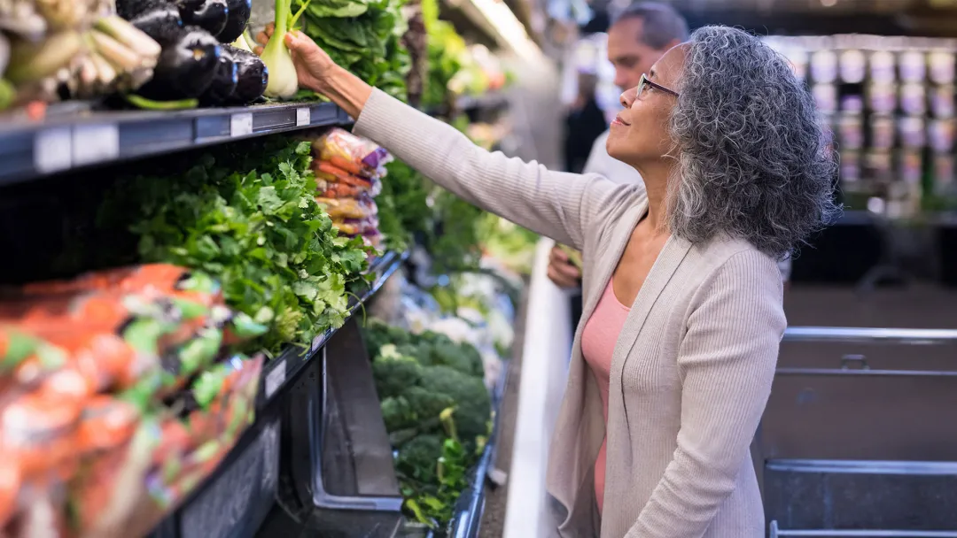 woman shopping for veggies