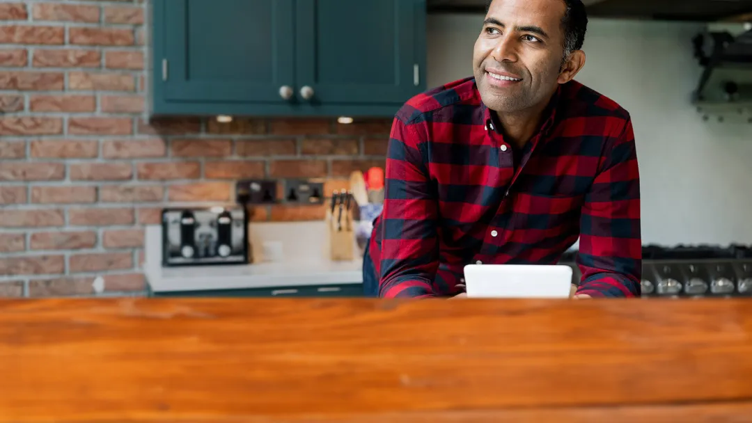 man-smiling-and-looking-away