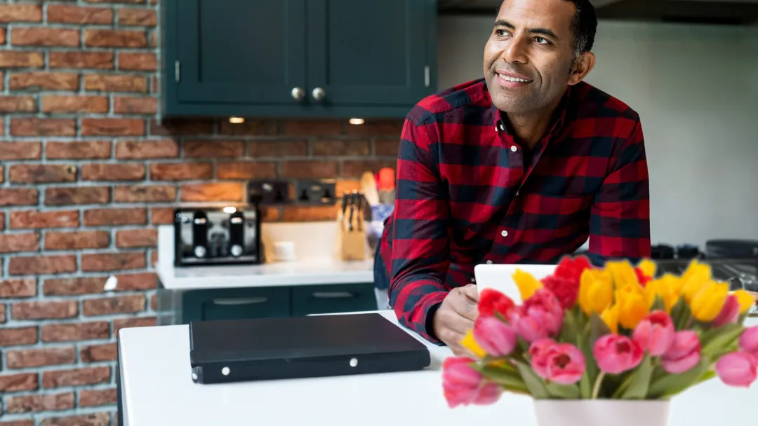 man-at-the-table-smiling