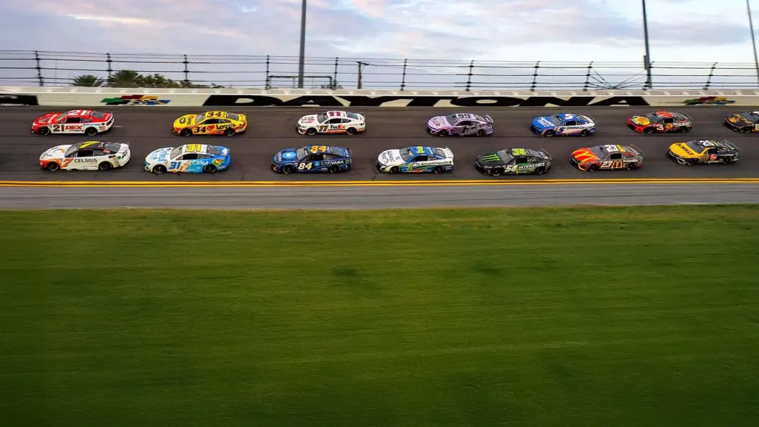 Cars racing on Daytona Speedway track