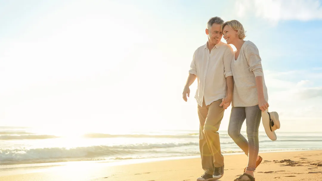 couple walking at the beach