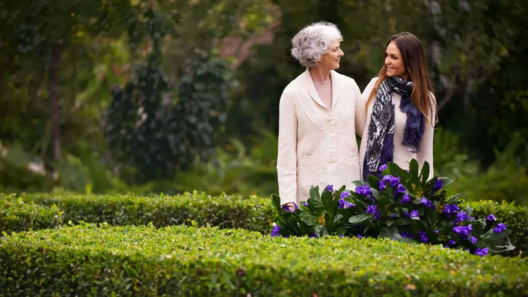 women walking and talking