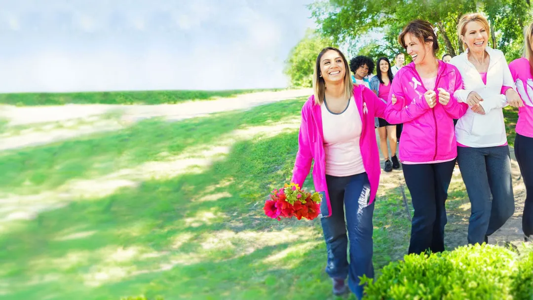 women in pink walking