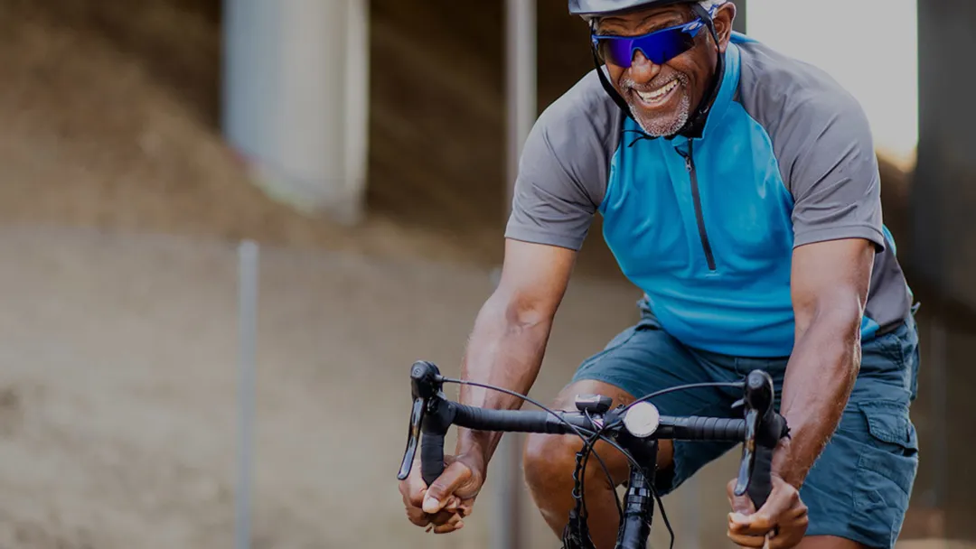 LP-Hero-Hero-Desktop-Vascular-Man-with-helmet-riding-a-bike