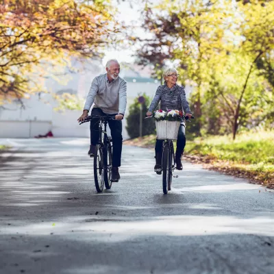 elder-couple-riding-a-bike