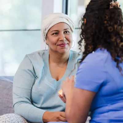 cancer patient woman beign checked by a doctor