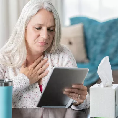 woman-reading-a-tablet