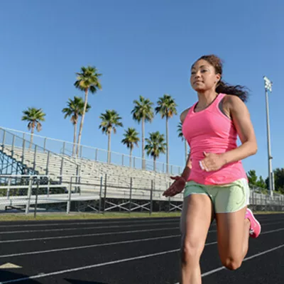 athlete-woman-running-on-a-track