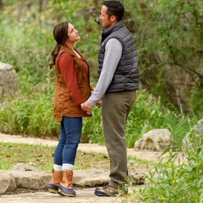 young-couple-holding-hands-looking-at-each-other