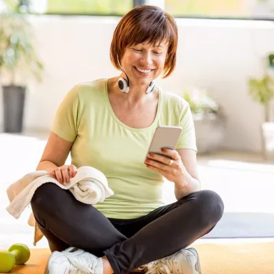 LP-Circle-Insert-Large-Neuro-General-WestFL-woman-sitting-with-phone