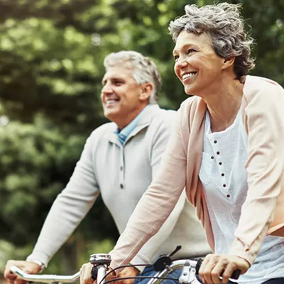 couple-riding-bikes