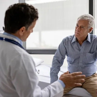 physician speaking to patient