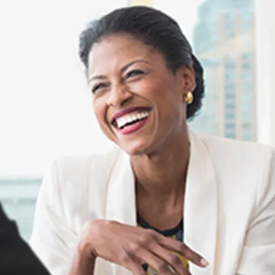 mature-woman-smiling-and-looking-away