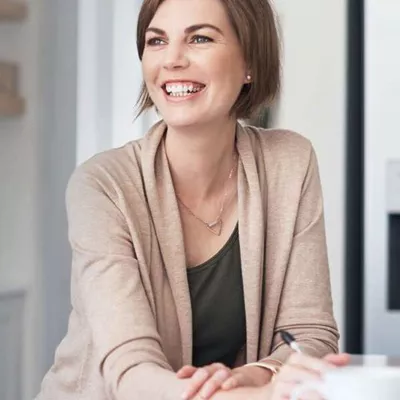 young-woman-smiling-looking-away