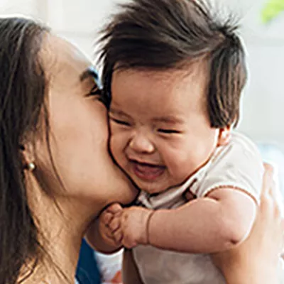 pregnant-mother-with-child-laughing