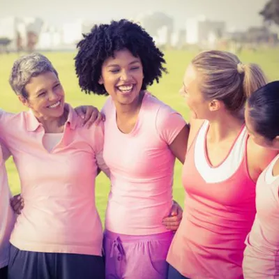 women-laughing-and-hugging