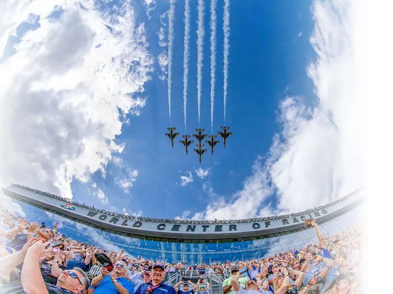 Daytona Speedway crowd with fighter jet flyover