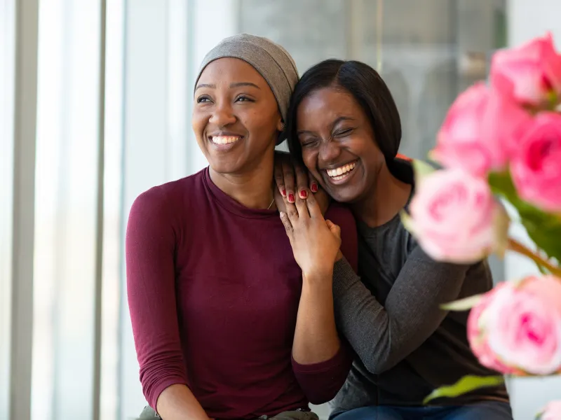 two-women-laughing-happily