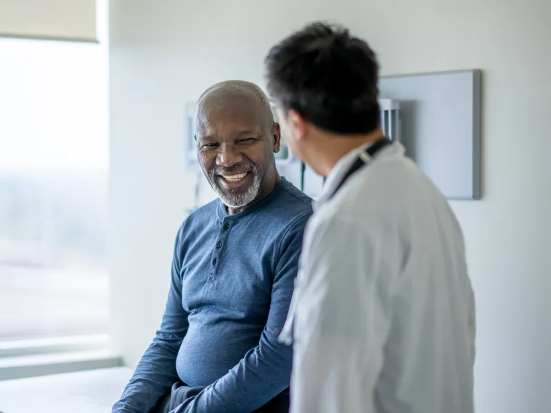 Man Talking to Doctor