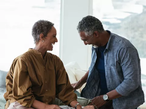 couple-laughing-in-a-room