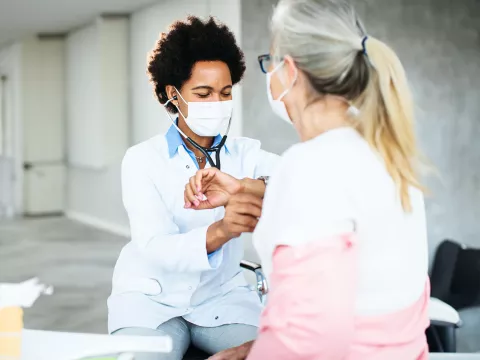 doctor-checcking-patients-heart