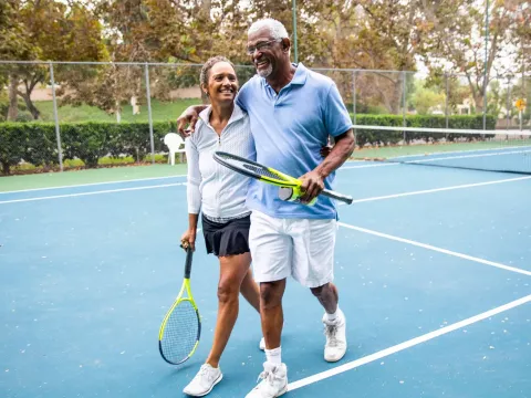 LP-50-50-Ortho-Knee-Texas-couple-playing-tennis.jpg