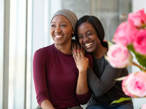 two-women-laughing-happily