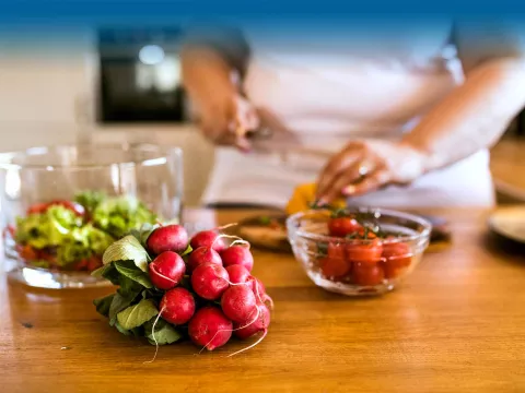 Woman chopping vegetables