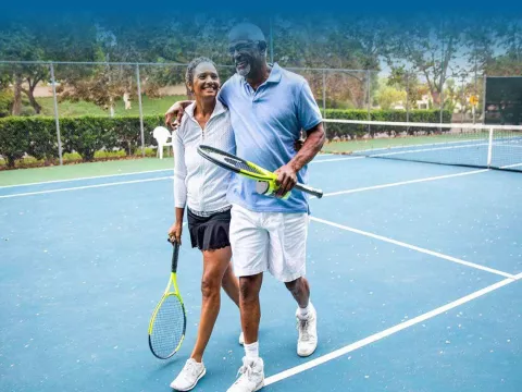 Couple Playing Tennis