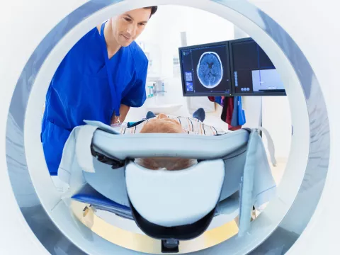 patient with nurse in MRI