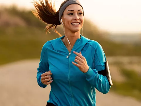 lp-background-image-westfl-neuro-brain-tumor-young-woman-jogging