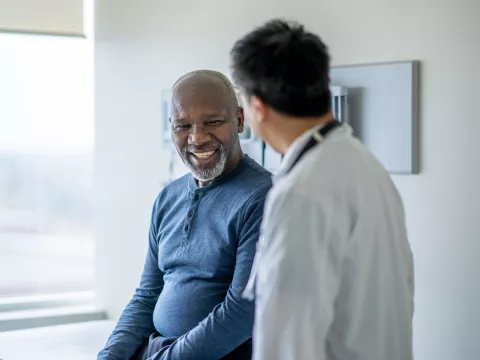 Man Talking to Doctor