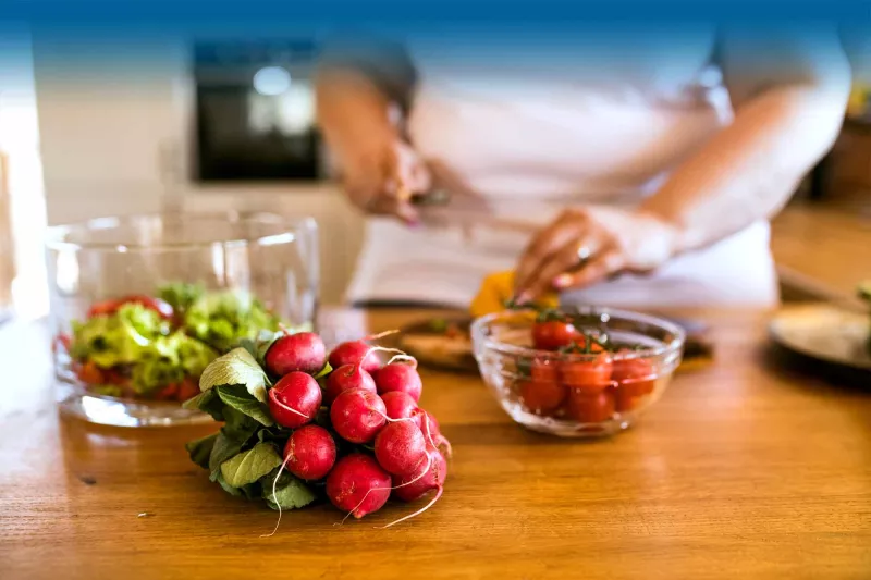 Woman chopping vegetables