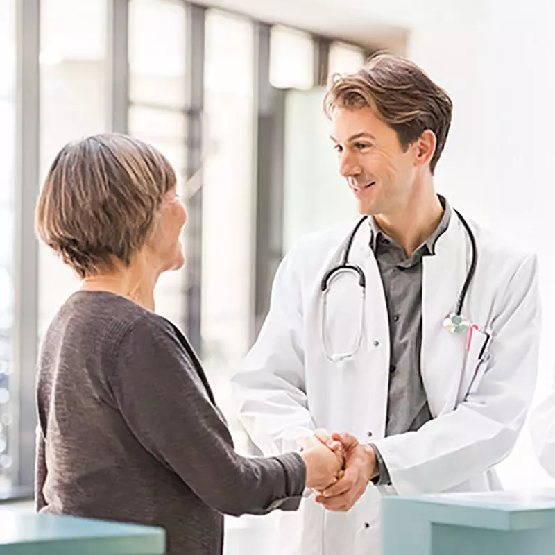 Doctor talking to patient.