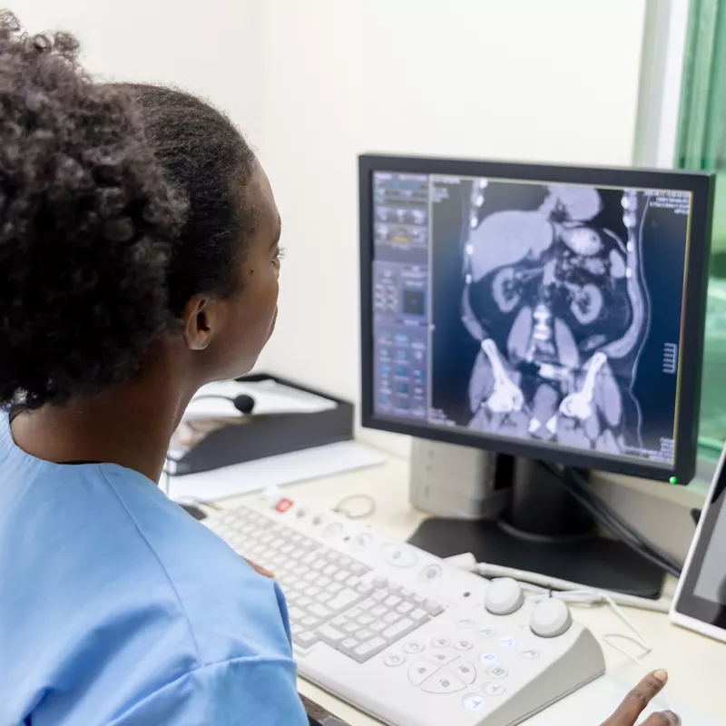 Technician looking at a ct scan
