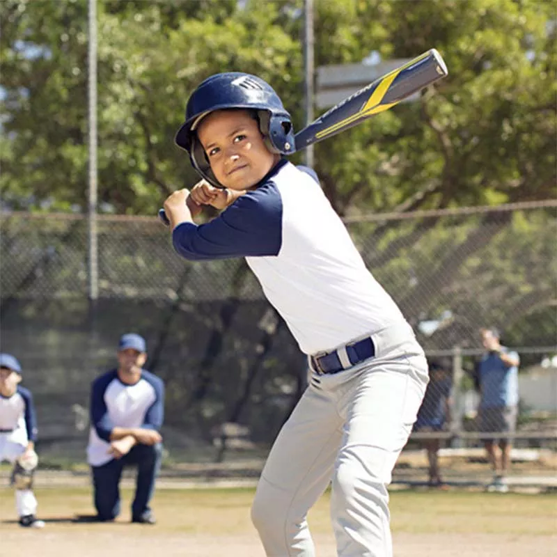 boy playing baseball ready to bat