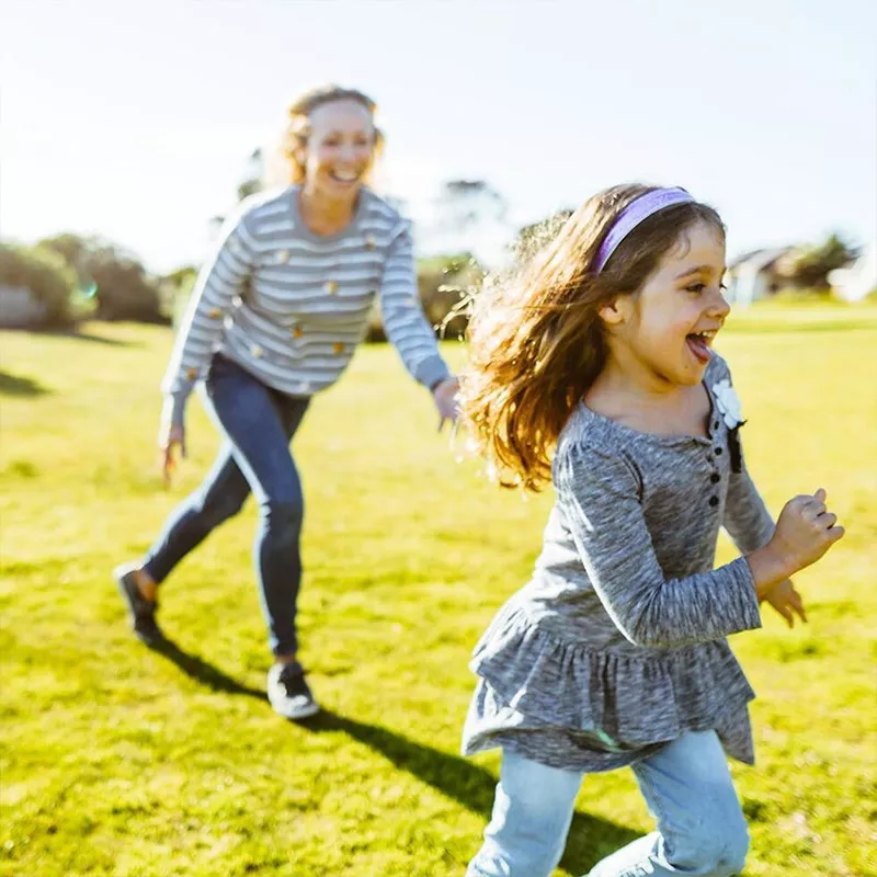 daughter-play-running-away-from-mother-while-laughing