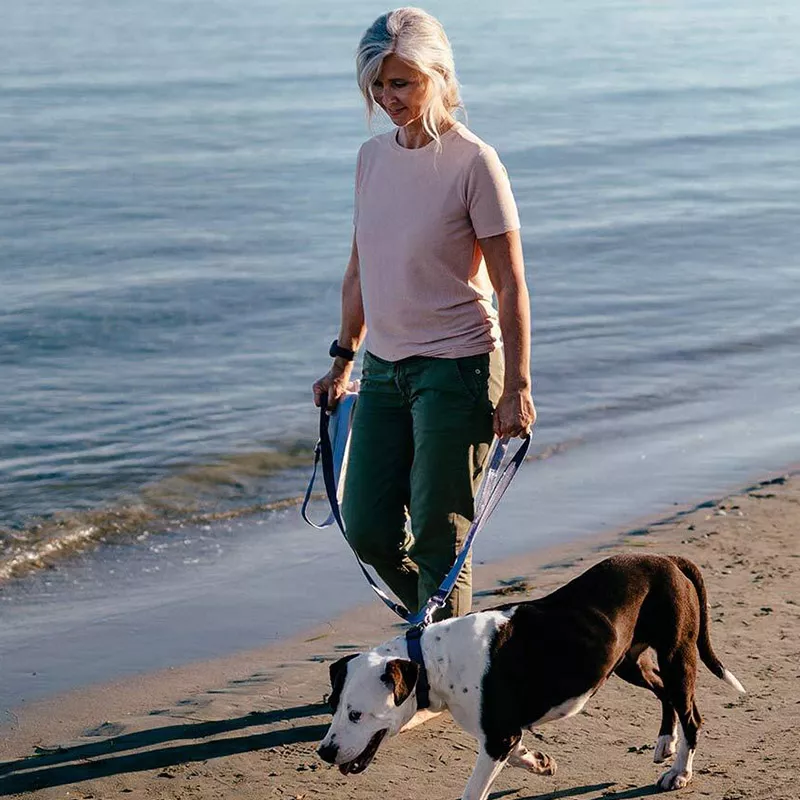 lp-circle-insert-800x800-rothman-woman-and-dog-on-beach.jpg