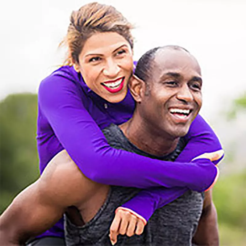 Black Couple running and Playing Outside