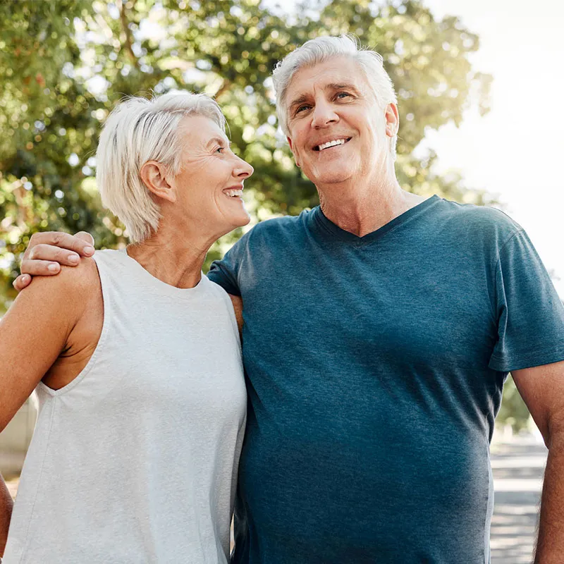 couple smiling outdoors