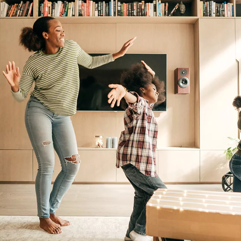 family-dancing-in-the-livingroom