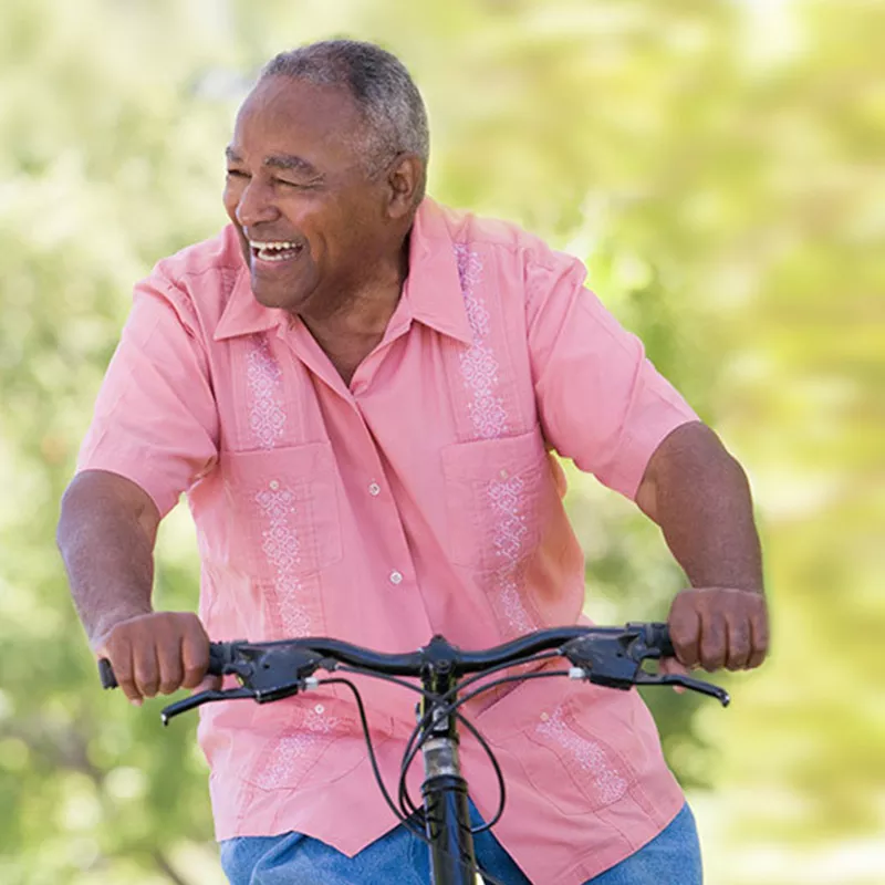 middle-aged-man-ridding-a-bike