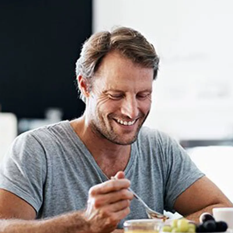 man-at-the-table-eating