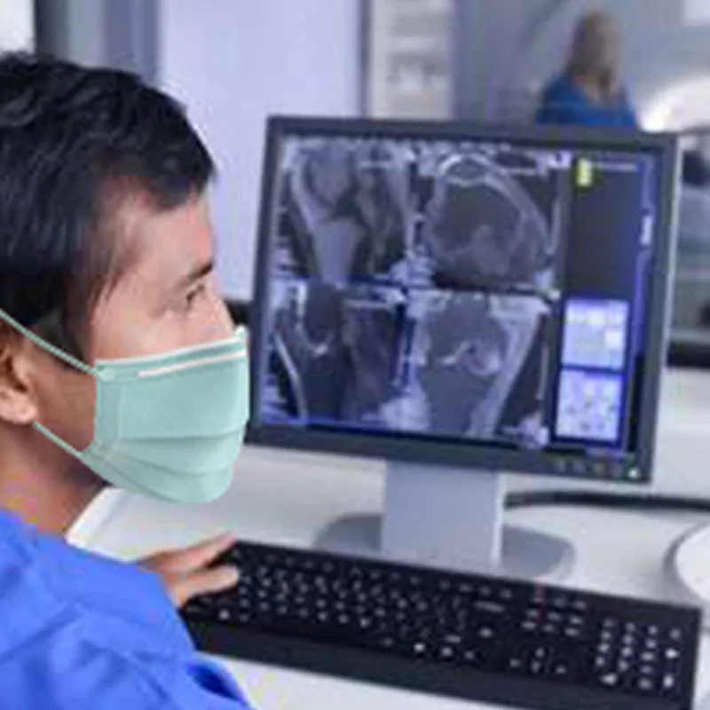 lp-circle-insert-large-westfl-neuro-brain-tumor-nurse-wearing-facemask-with-computer