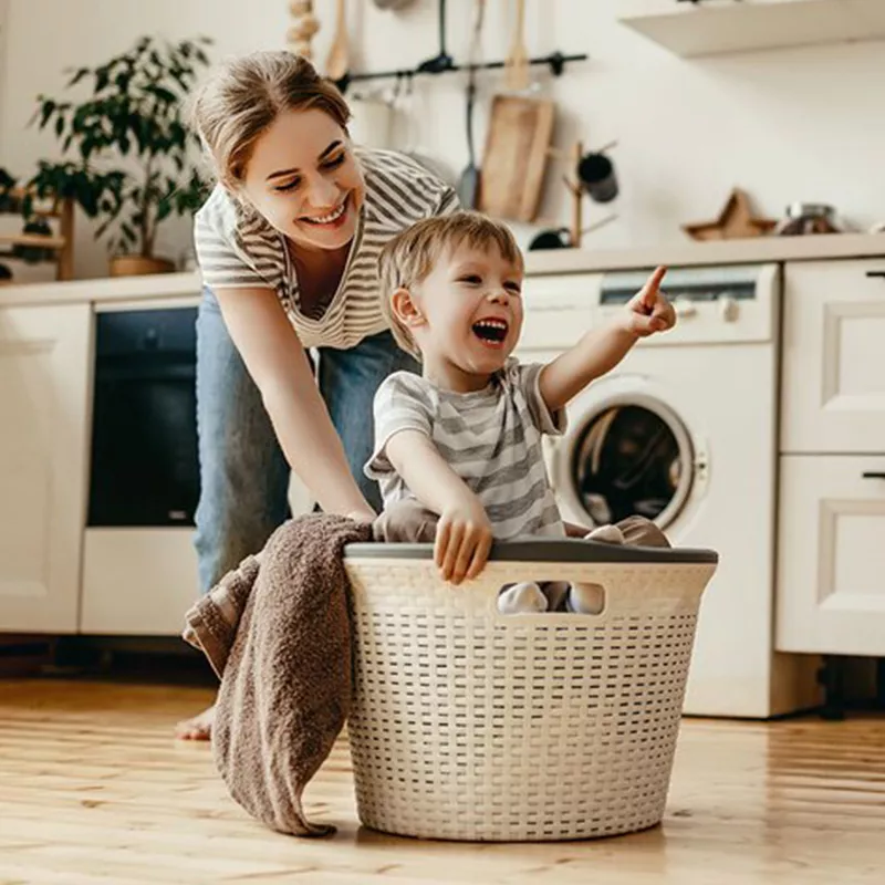 mother and son playing indoors