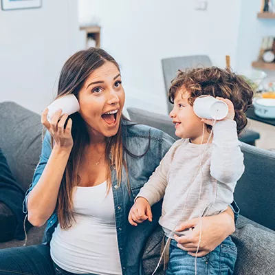 LP-Circle-Insert-Small-central-pediatrics-neuro-woman-with-daughter-smiling